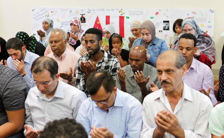 Image: Members of the Louisville Islamic Center pray together before an inter-faith service to honor Muhammad Ali, the former world heavyweight boxing champion after he died at the age of 74 on Friday at the Islamic Center in Louisville