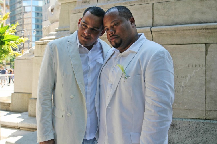 Alphonso, right, and Melvin pose at their wedding in New York's Central Park in 2011.