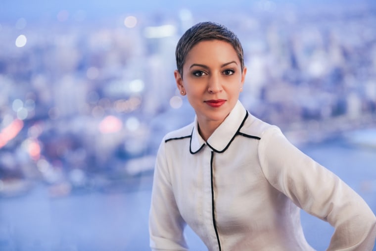 Headshot of Carmen Rita, author of \"Never Too Real.\"