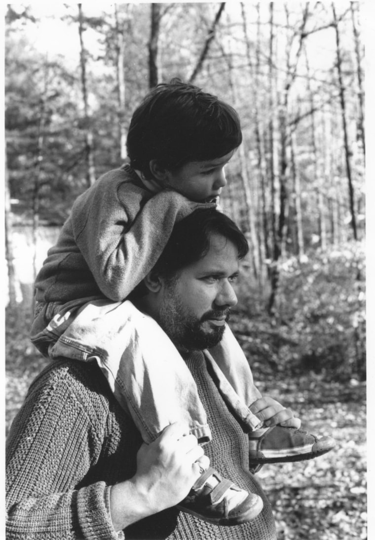Poet Martin Espada and his son Klemente, taken by Espada's father, renowned civil rights and community activist as well as acclaimed photographer, Frank Espada.