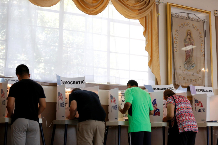 Image: People vote at Assumption Church during the U.S. Presidential Primary Election in Los Angeles