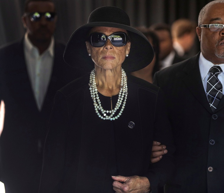 Image: Lonnie Ali, widow of Muhammad Ali, leaves the funeral home to begin a procession through his hometown of Louisville