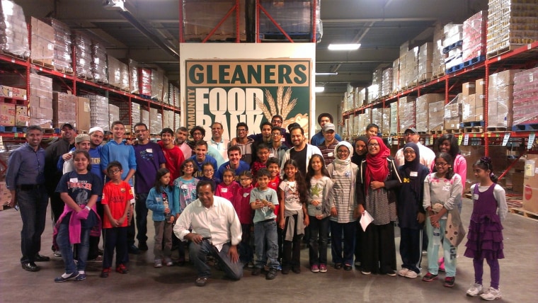 Michigan Muslim Community Council (MMCC) Ramadan Fight against Hunger campaign volunteers sorting food at Gleaners Food Bank, Detroit, Michigan, 2015.