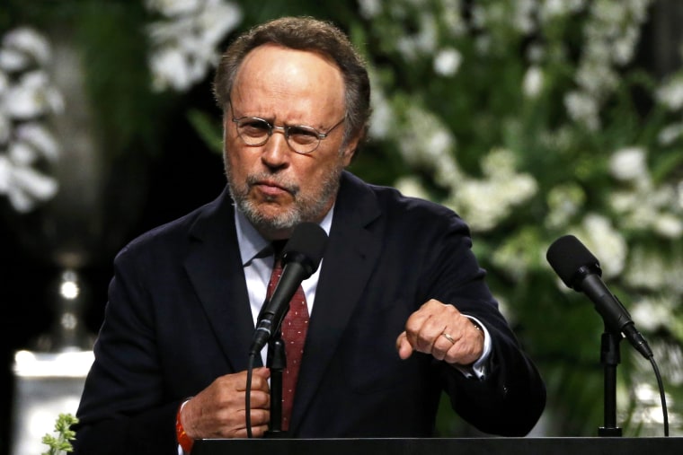 Image: Actor Billy Crystal speaks at a memorial service for the late boxer Muhammad Ali in Louisville, Kentucky