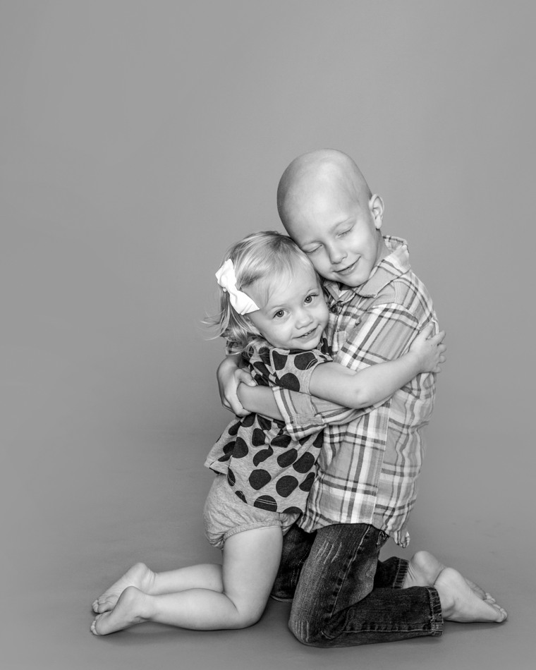 "I've actually been photographing this family since his mom was pregnant with him and had done several family sessions before he was diagnosed with cancer when he was four years old," said Kendrick of her photo. "This shot was when the family came in when the child was undergoing chemotherapy."