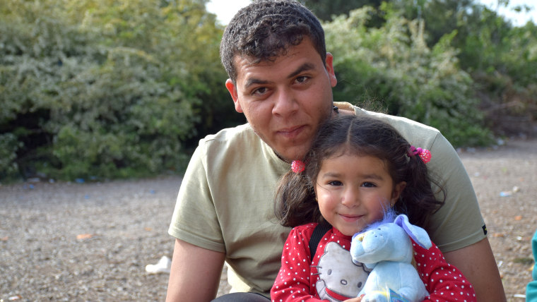 Refugee dad and daughter