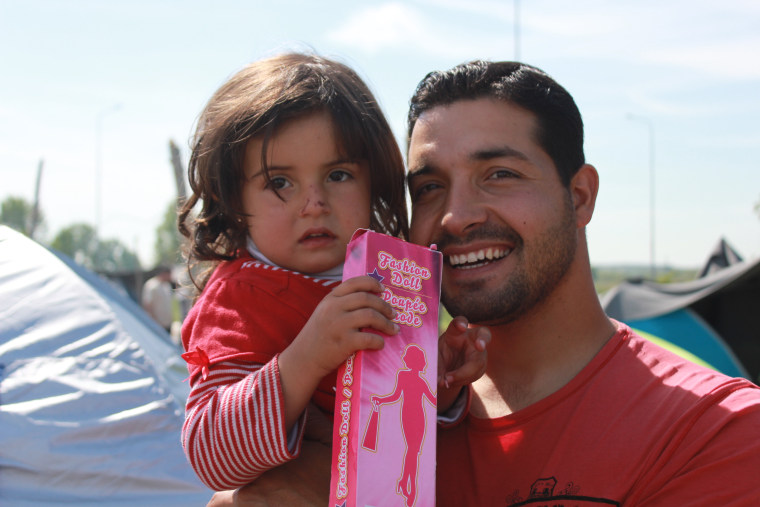 refugee dad with family