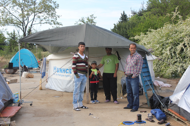 refugee dad with family