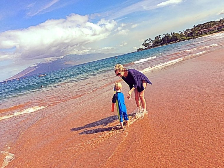 Lindsie Chrisley plays with Jackson at the beach.