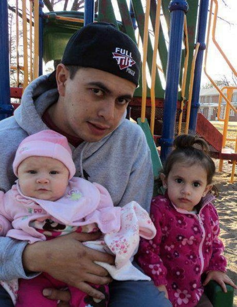 Private First Class Gustavo Rios-Ordonez, five years ago with his two daughters,