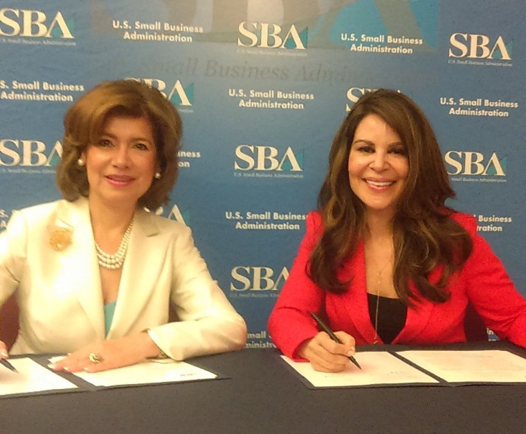 Mar?a Contreras-Sweet (l) and Nely Gal?n at ceremonial agreement signing, June 13, 2016, Washington, D.C.