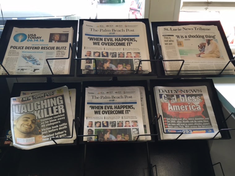 Newspapers on Display at a shop in the Main Street Village Pantry.