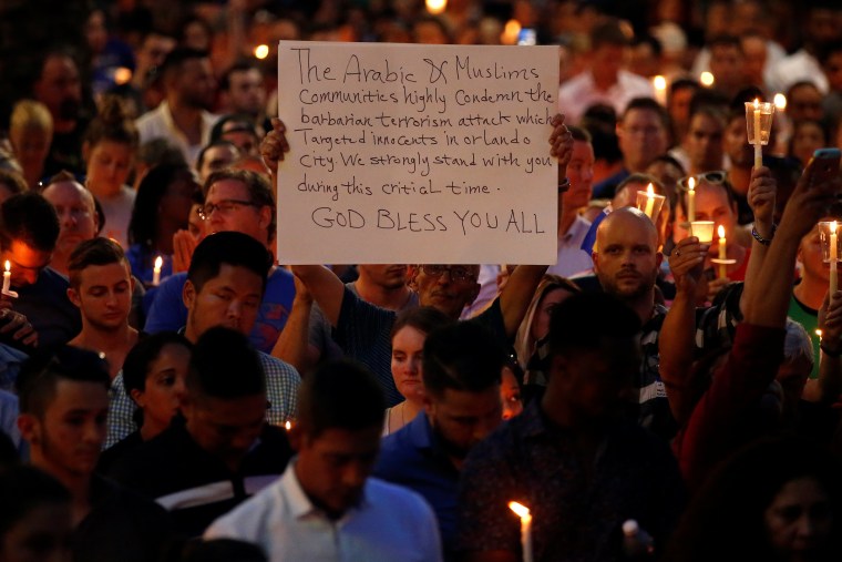 Image: Candlelit memorial service for victims of Pulse massacre