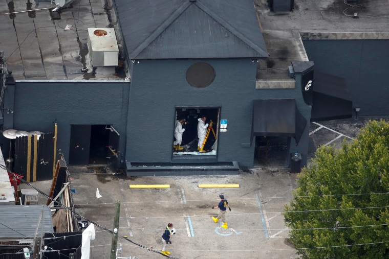 Image: FBI officials collect evidence at Pulse gay night club some days after mass shooting in Orlando