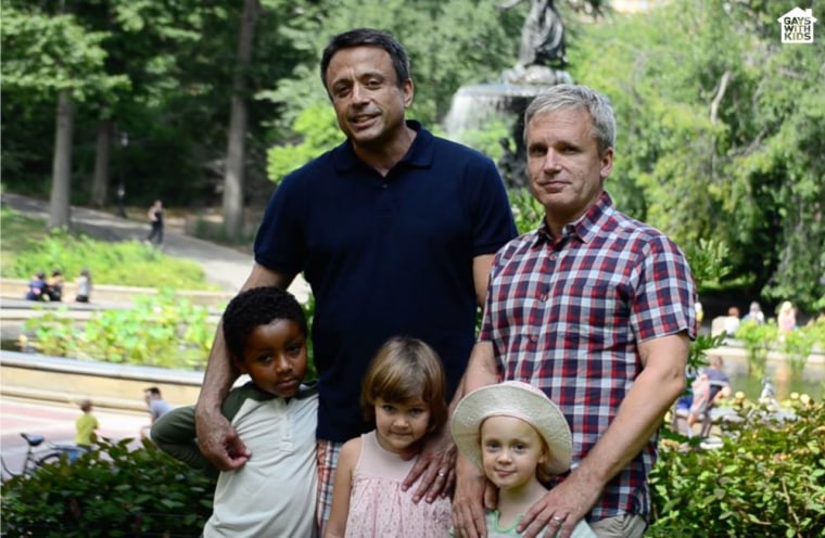 Brian Rosenberg and Fred van Gameren with their children.