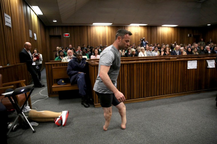 Image: Paralympic gold medalist Oscar Pistorius walks across the courtroom without his prosthetic legs during the third day of the resentencing hearing for the 2013 murder of his girlfriend Reeva Steenkamp, at Pretoria High Court