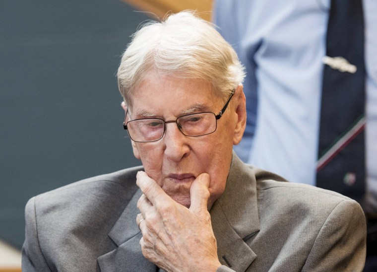 Image: Defendant Hanning, a 94-year-old former guard at Auschwitz death camp, sits in a courtroom before his verdict in Detmold