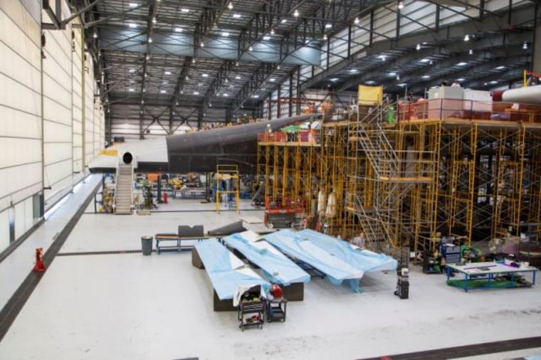 Handout photo of Vulcan Aerospace's Stratolaunch rockets' left fuselage under construction in Mojave, California