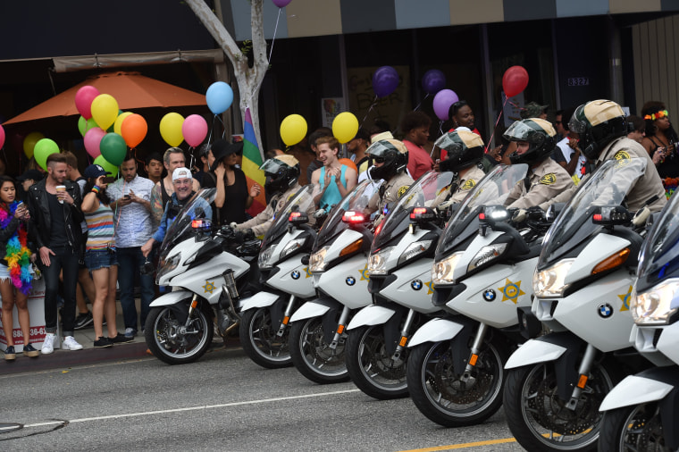 Motorcycle police officers provide security for the 2016 Gay Pride Parade June 12, 2016 in Los Angeles, California. Security tightened in the aftermath of the deadly shootings June 12 at the Pulse Nightclub.