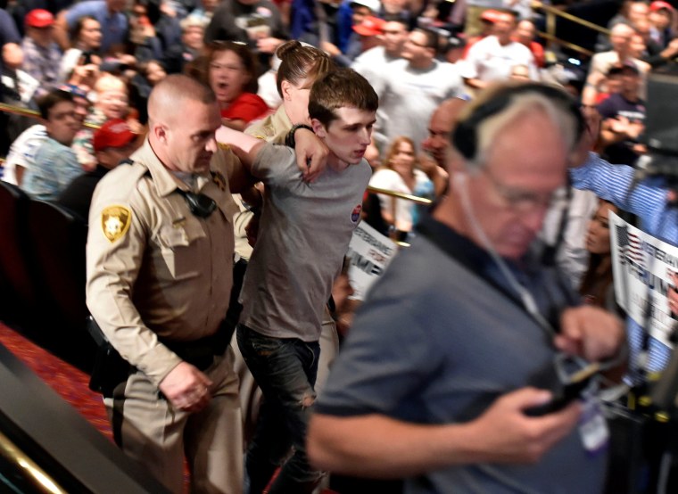 Image: Las Vegas police leads a protester from Republican U.S. presidential candidate Donald Trump's campaign rally at the Treasure Island Hotel & Casino in Las Vegas