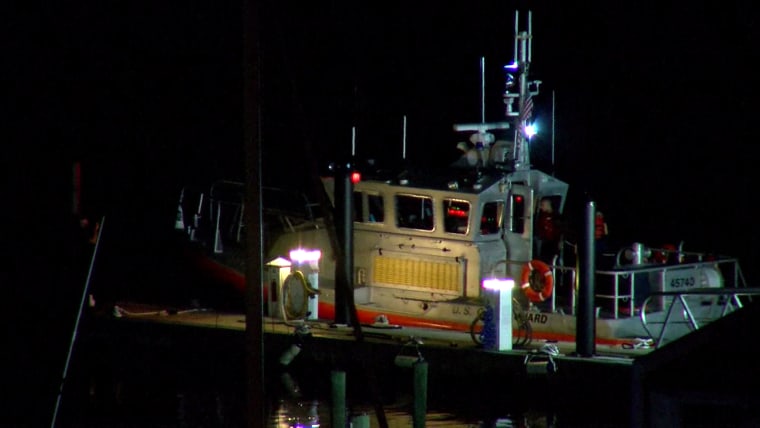IMAGE: A vessel searching for the missing father and his three children.