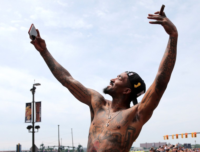 Image: Cleveland Cavaliers JR Smith takes a selfie in downtown Cleveland