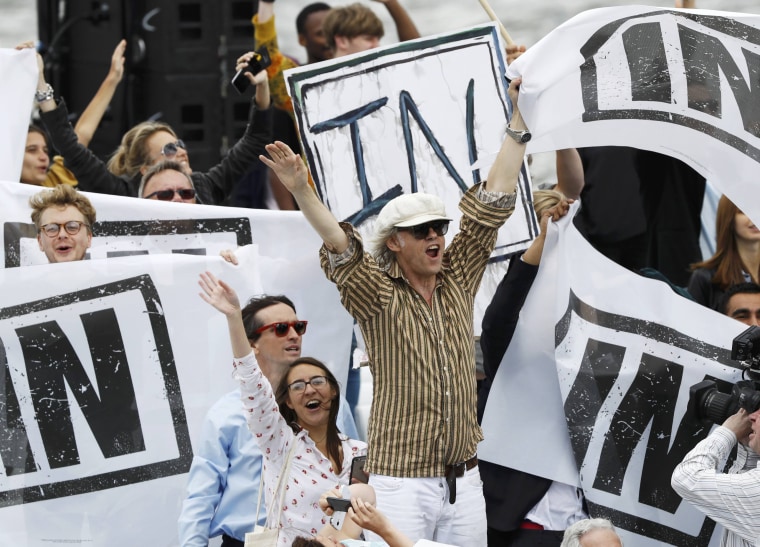 Image: Musician and campaigner Bob Geldof (C) joins a counter demonstration as a flotilla of fishing vessels campaigning to leave the European Union sails up the river Thames in London