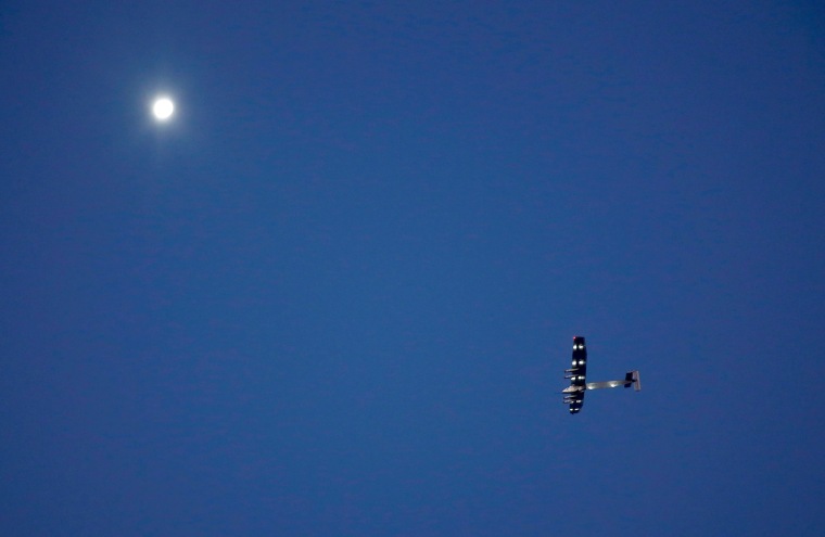 Image: The solar-powered plane Solar Impulse 2 before landing at San Pablo airport in Seville, southern Spain