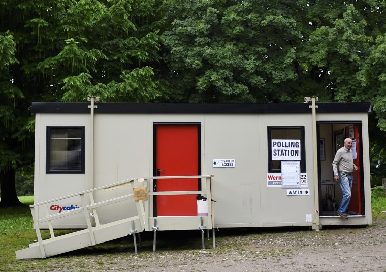 Image: A man leaves after voting at a polling station for the Referendum on the European Union in Biggin Hill