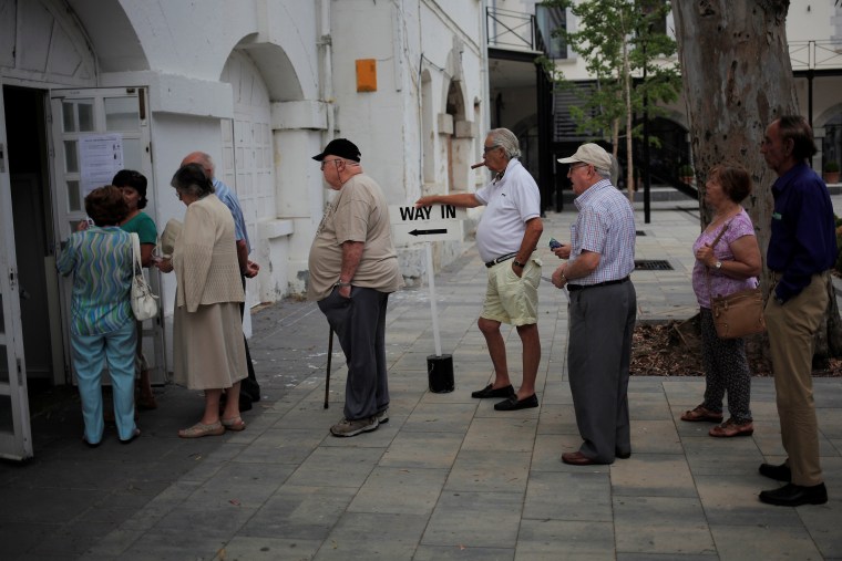 Image: People wait in line to cast their ballots during the EU referendum at a polling station in the British overseas territory of Gibraltar