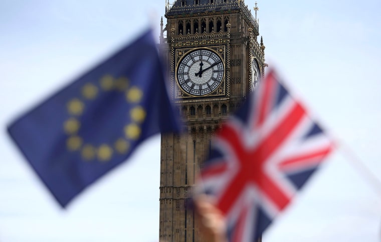 Image: A British flag and an EU flag