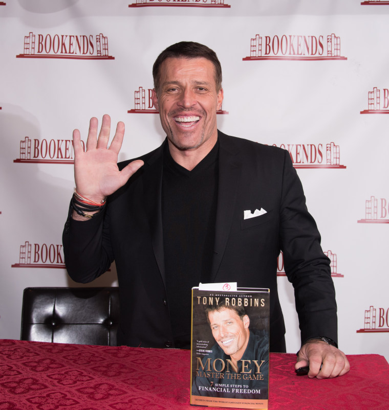 Tony Robbins Signs Copies Of His Book "Money: Master Of The Game"