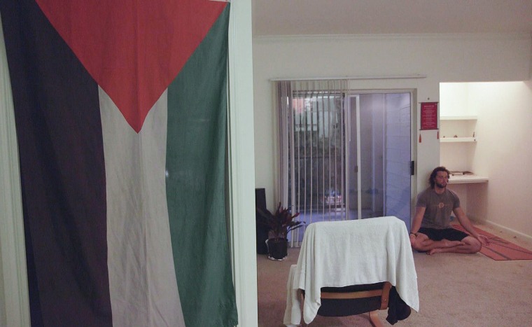 A Palestinian flag hangs in Mohammed al-Khatib's Houston apartment.