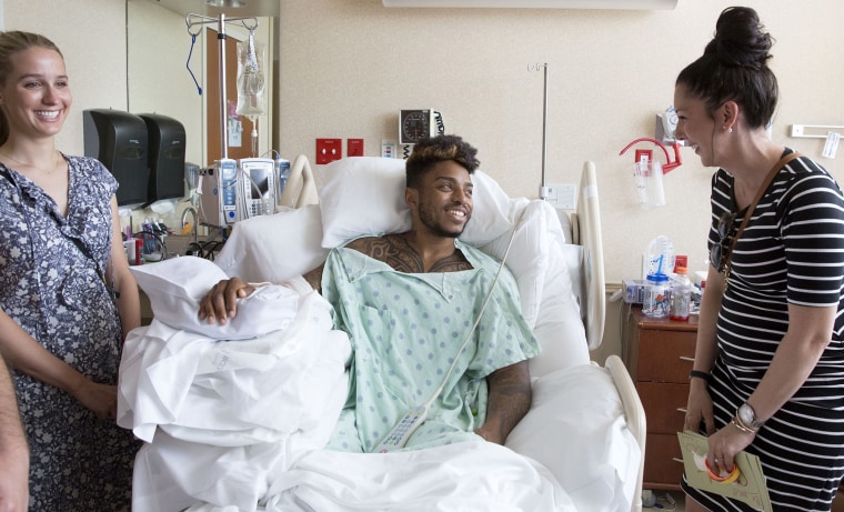 Boston survivor Eliza Gedney (left) and Michelle L'Heureux visit with Pulse survivor Rodney Sumter.