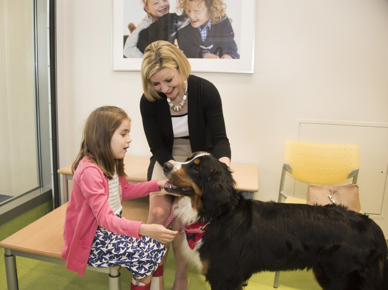 Purina veterinarian Dr. Zara Boland and her dog Rhumba