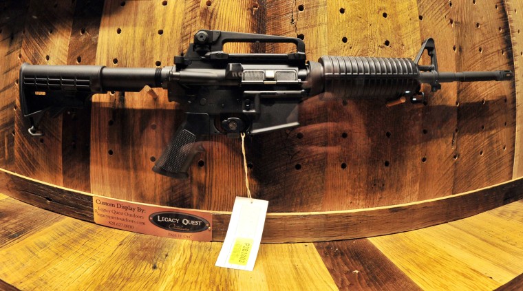 Image: An AR-15 rifle is seen at 142nd annual NRA convention on May 4, 2013