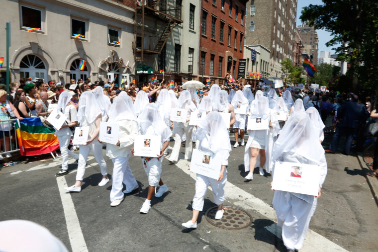 Ghosts representing the Orlando Massacre victims march in the 2016 New York City Pride March