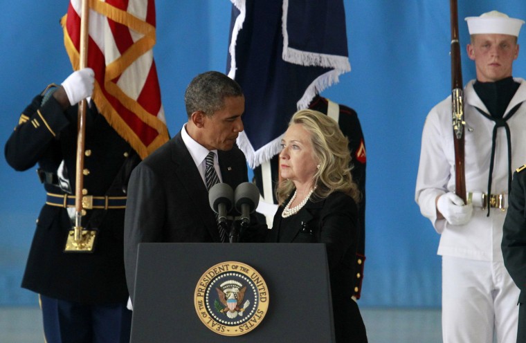 Image: U.S. President Obama and Secretary of State Clinton deliver remarks during a transfer ceremony of the remains of U.S. Ambassador to Libya, Chris Stevens and three other Americans killed this week in Benghazi, at Andrews Air Force Base near Washingt