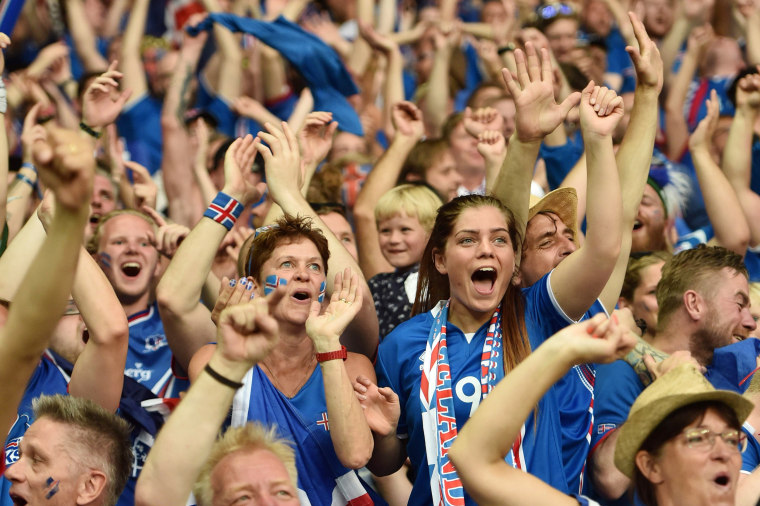 Image: Iceland supporters cheer a goal
