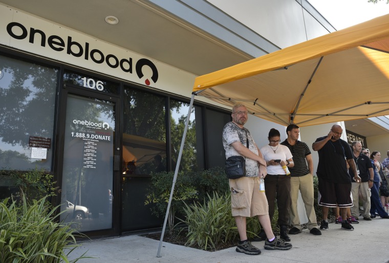 People wait to donate blood at the OneBlood center on June 13, 2016 in Orlando, Florida.