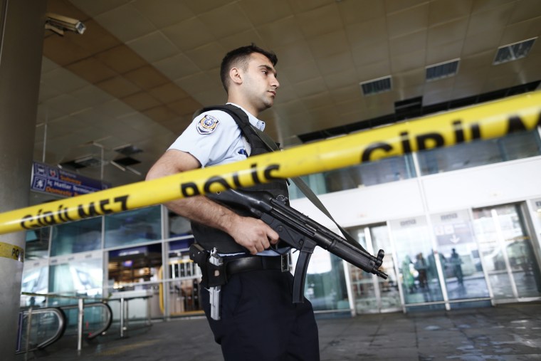 Image: Armed Turkish police officer at Ataturk Airport in Istanbul