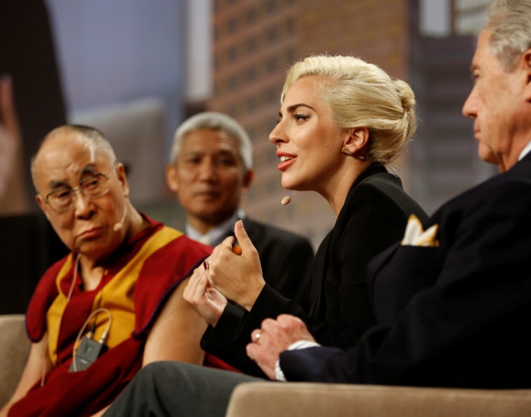 Image: The Dalai Lama and singer Lady Gaga appear together for a question and answer session on "the global significance of building compassionate cities" at the U.S. Conference of Mayors 84th Annual Meeting in Indianapolis