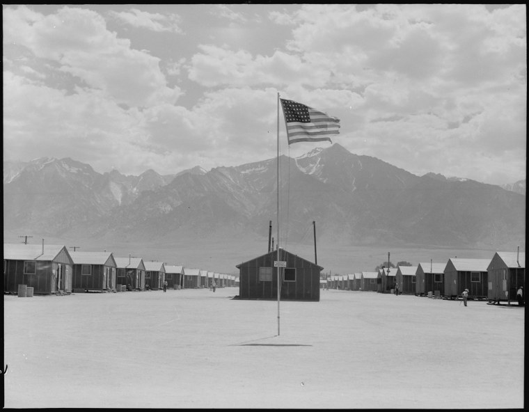 Manzanar Relocation center, Manzanar, California. Street scene of barrack homes at this War Relocation Authority Center. The windstorm has subsided and the dust has settled. July 3, 1942