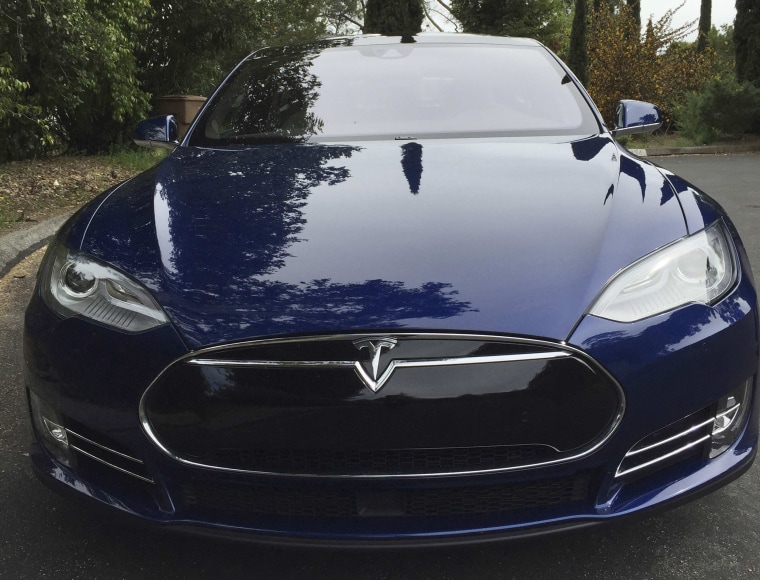 Image: A Tesla Model electric vehicle is shown in San Francisco, California
