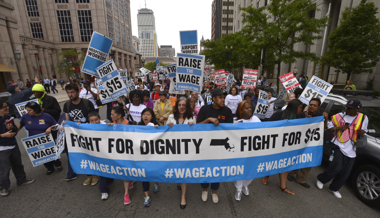 Workers protest growing wage inequality.