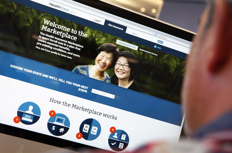 Image: A man looks over the Affordable Care Act signup page on the HealthCare.gov website in New York in this photo illustration