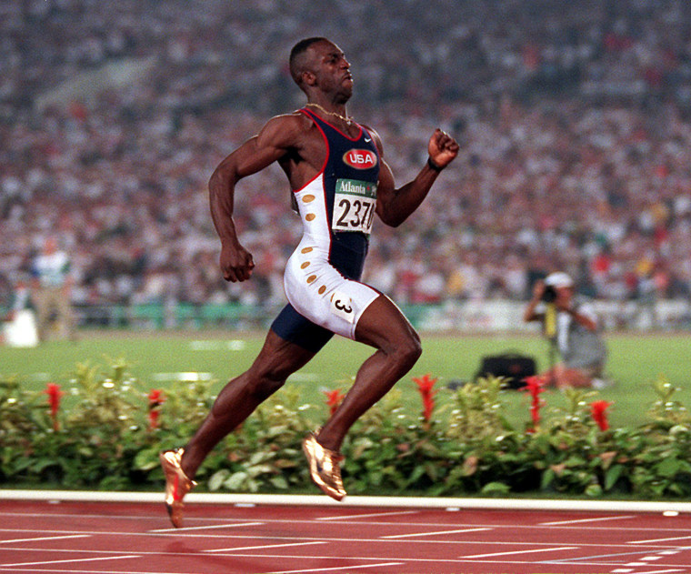 Michael Johnson On How He Learned To Love His Funny Upright Running Style