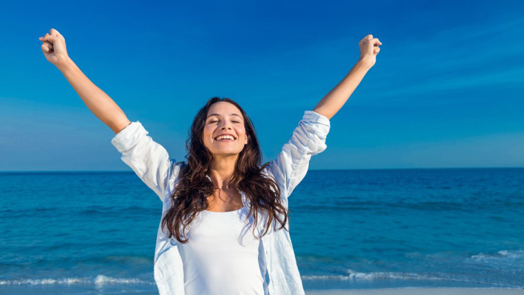 Smiling woman at beach