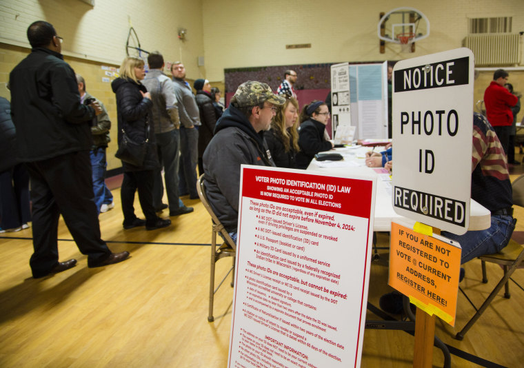 Image: Voters take to the polls in Wauwatosa, Wisconsin