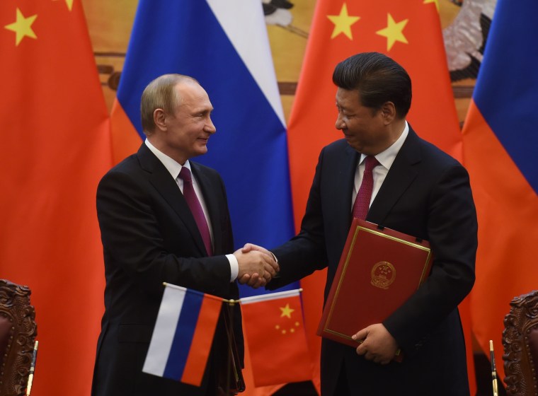 Image: Vladimir Putin and Xi Jinping on June 25, 2016